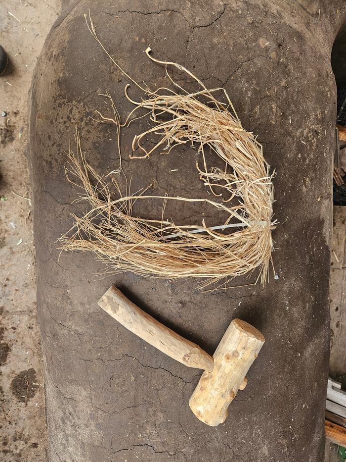 I don't have a flax break, and didn't fancy making one for this small of a batch, so I broke the stems over the edge of a board, with a mallet