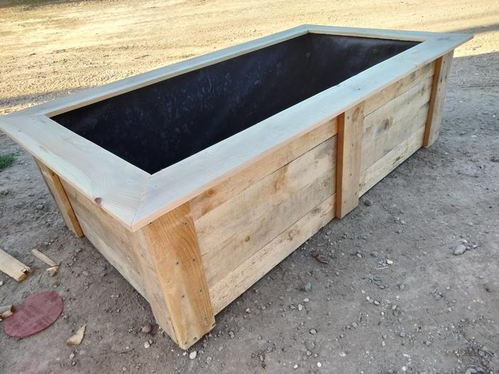 raised beds from old redwood fence boards