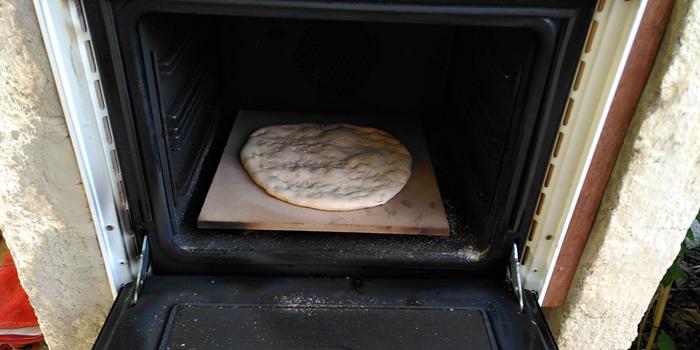 Pizza stone with trial flat bread