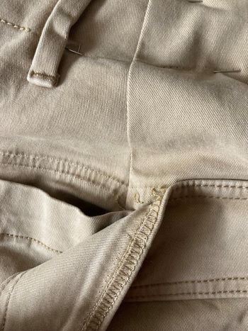 reposition pants pocket