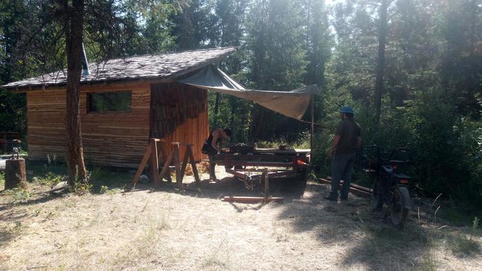 Working on the SSSS next to the sauna, July 2024. Tarp for sanity. 