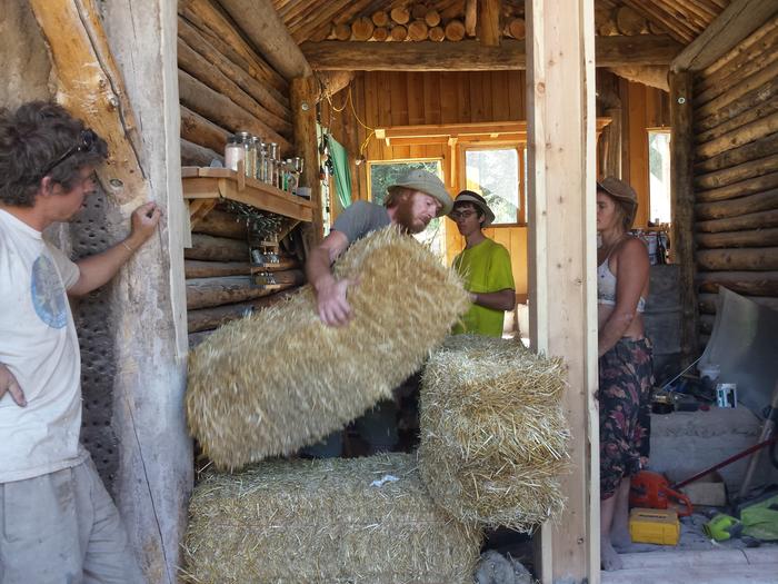 Ernie teaching us a thing or two about straw bales.