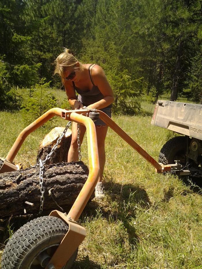 me hooking up a log to be skidded