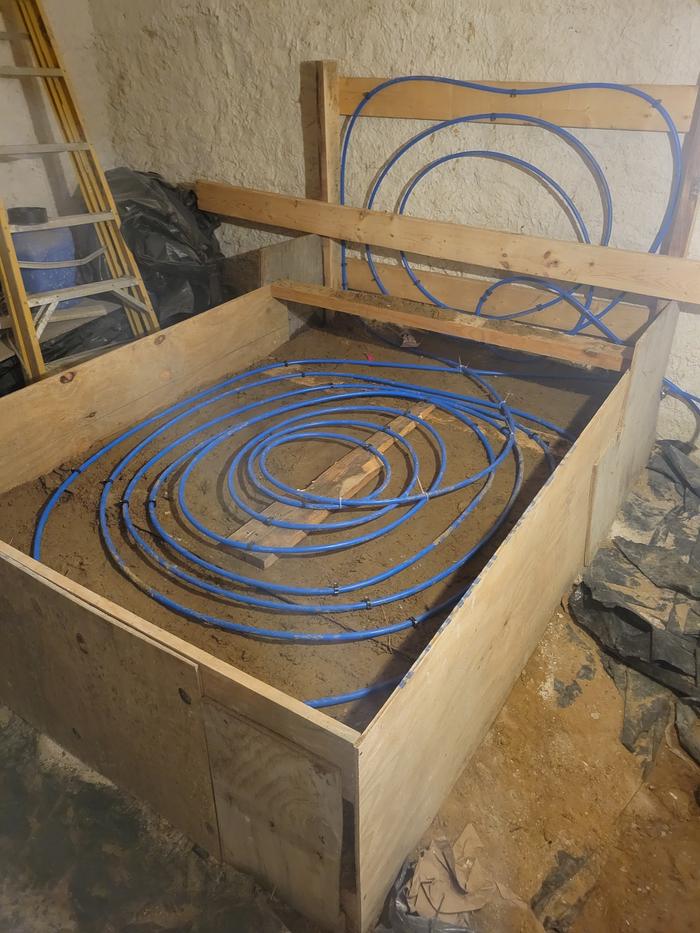My radiant bed before the top layer of cob is added