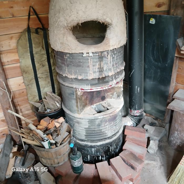 Cob hat on a cottage rocket