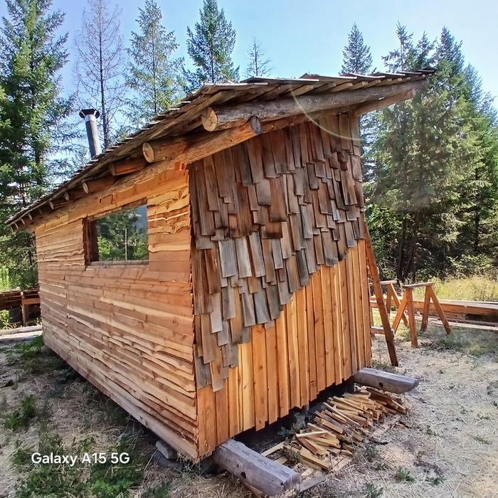 board and batten siding with shakes on a skiddable sauna structure