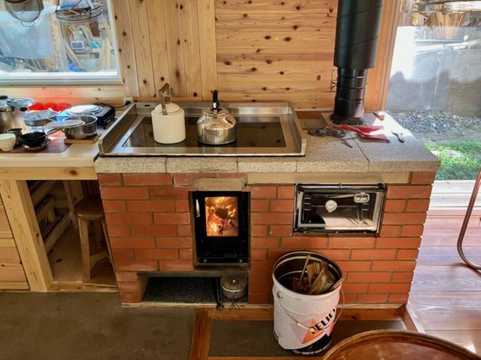 A Walker Continental stove in a kitchen in Japan. It is made from brick with a glass cooktop