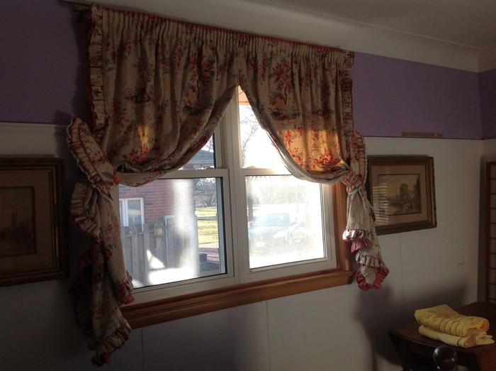 guest bedroom with new drapes from reused curtains