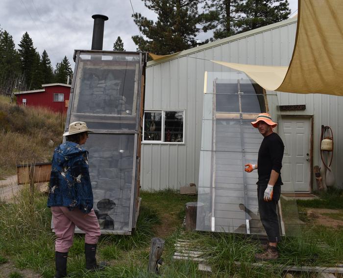 HC Stephen showing us the solar dehydrators - vanilla and rocket-assist