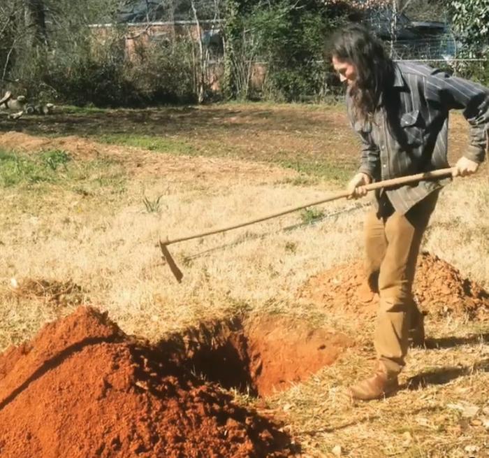 found this of me digging one of these catch pits in Feb. 2017, lots of red clay