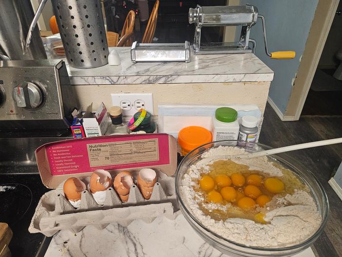 Noodles in prep, noodle press in the background