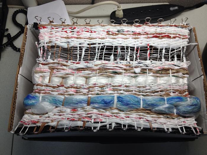 weaving of plarn, jute twine, plastic bags, and strands of paper-clips