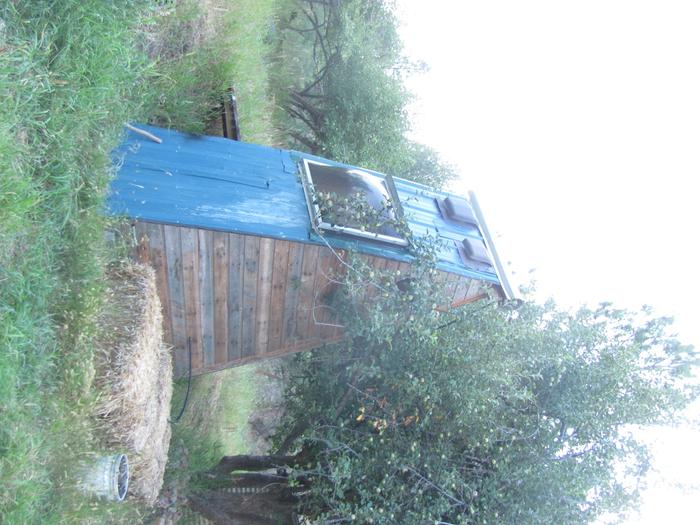 Back view. Urine diversion goes into the straw bales.