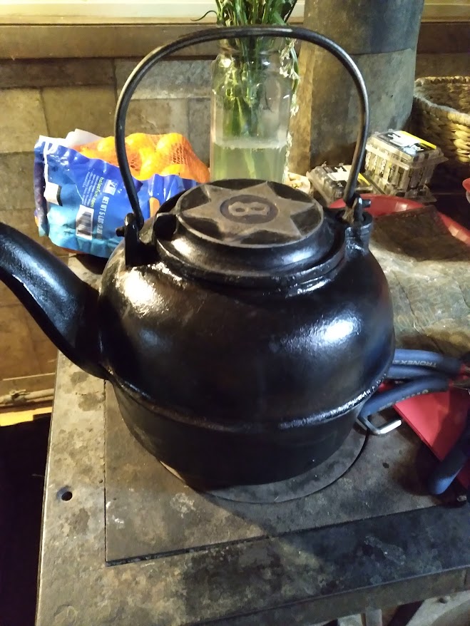 40 year old cat iron kettle