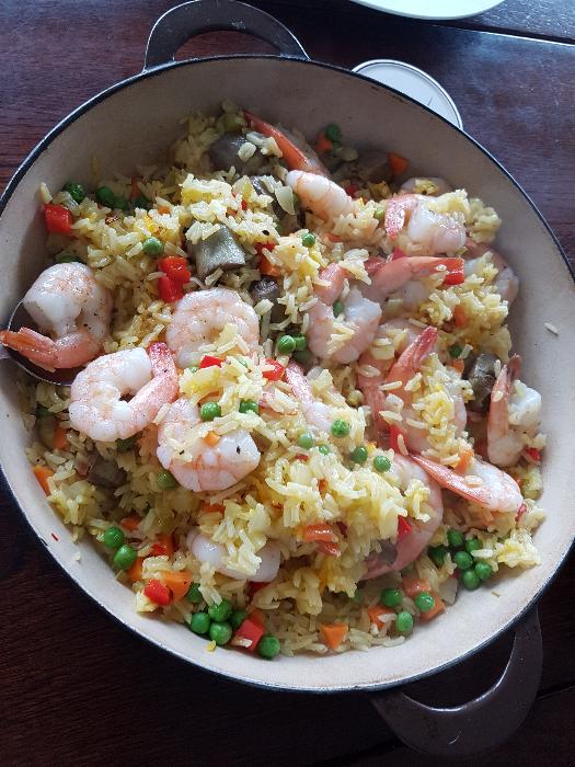 Paella with prawns and peas