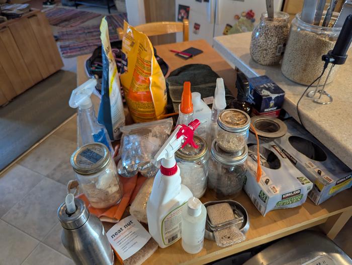 water heater cleaning supplies citric acid sitting on a table in a kitchen