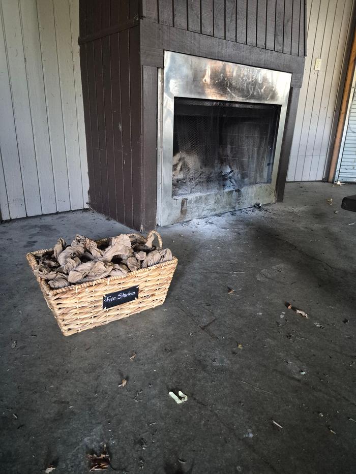 Cute basket - labeled with packaging paper twists inside it. Basket is more than 2' away from fire and reasy for use!