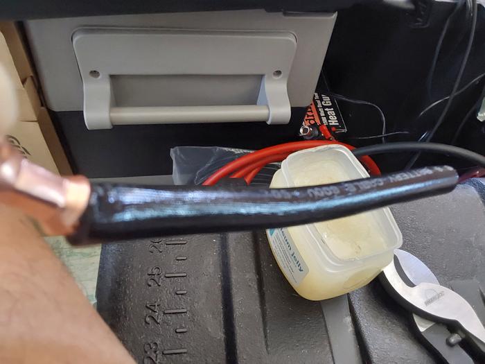Lubing the cable makes heatshrink easier to get on! 