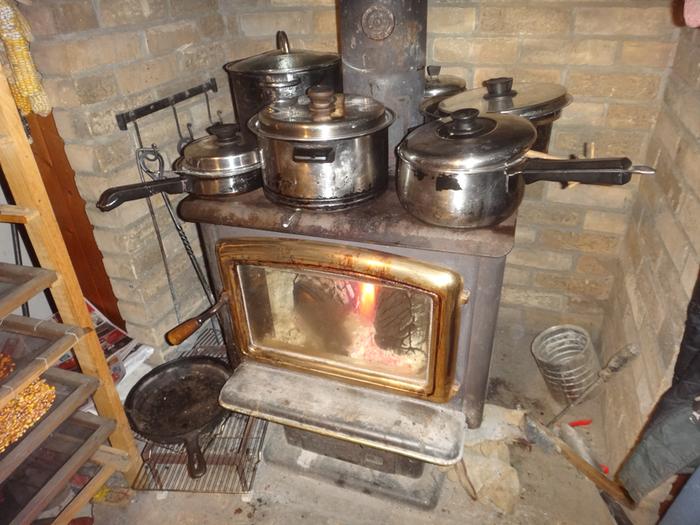 pots and pans on a woodstove