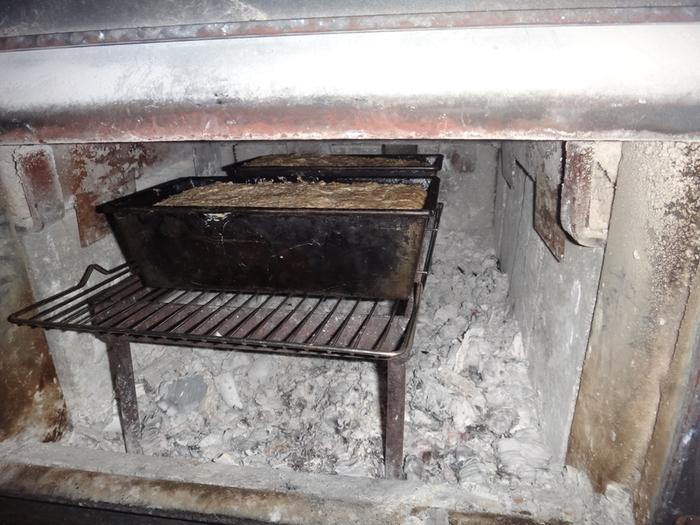 baking a couple of loaves in the woodstove firebox