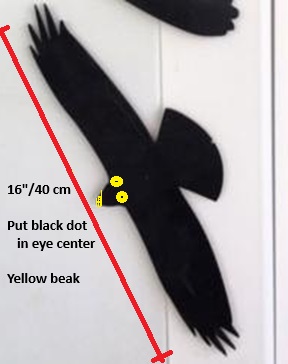 Scare bird with yellow eyes and beak, flat black paint