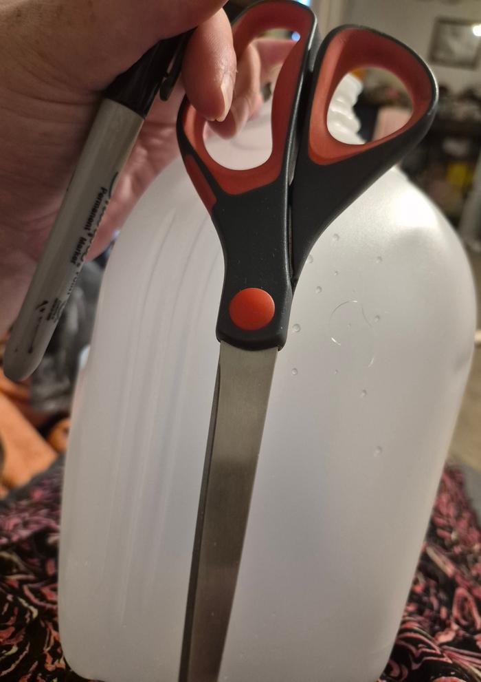 Jug and scissors