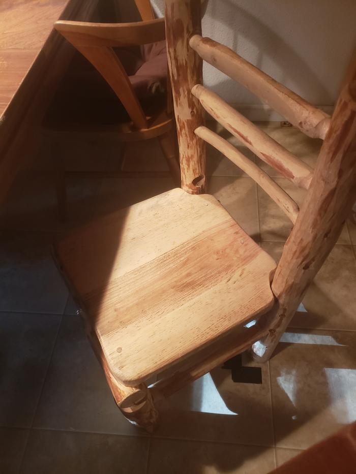 We fixed one of the homemade kitchen chairs with a bit of pine pitch. 