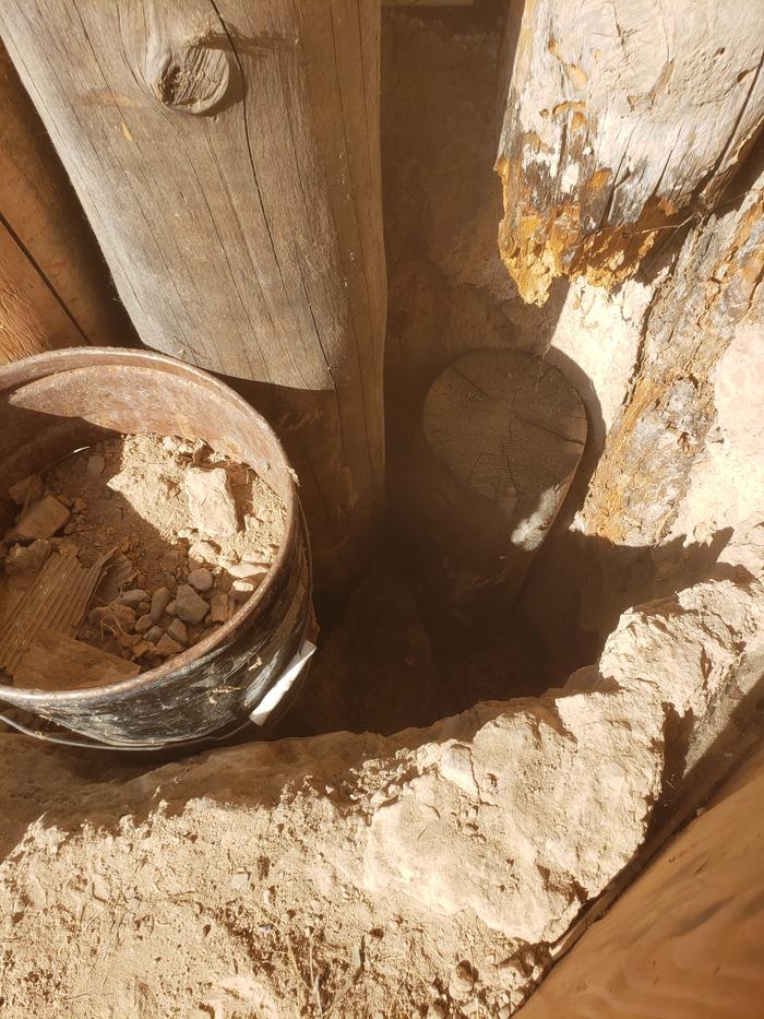 Holding the log in place while acquiring more gravel