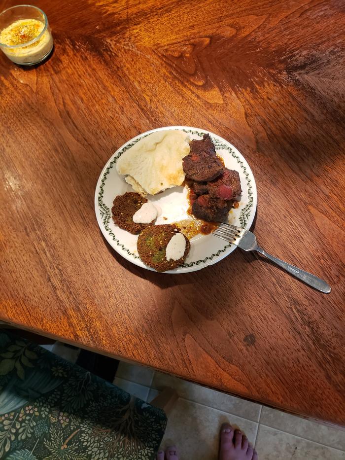 The full plate: pita, braised lamb, falafel, hummus, tahini sauce all homemade