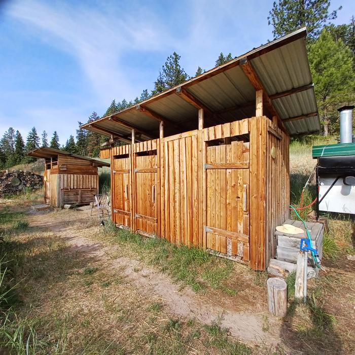 The three bay shower shack and willow bank next to the rocket water heater
