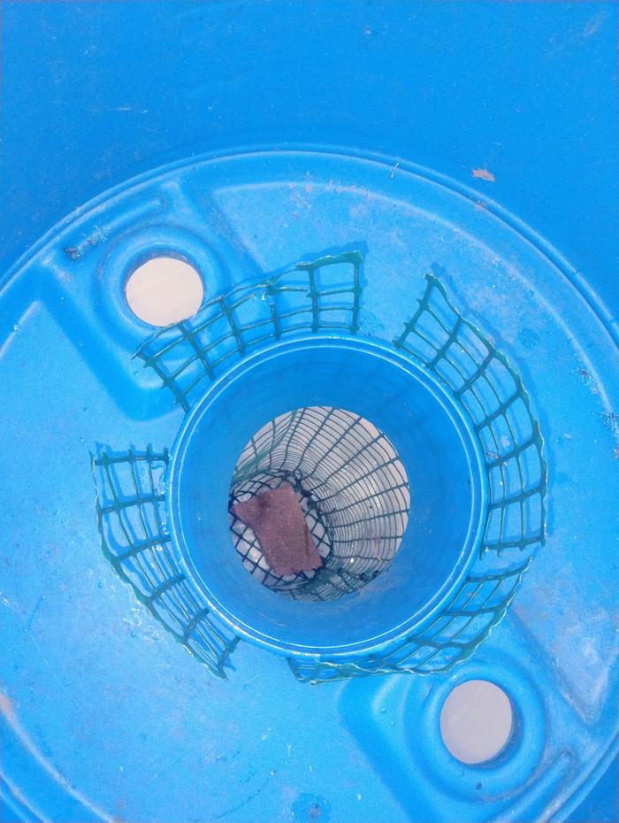 Inside view displaying the basket that will hold the wicking material 