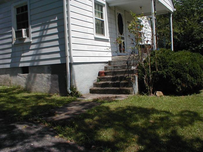 I'd like to rebuild the porch, extending it fully across the front of the house