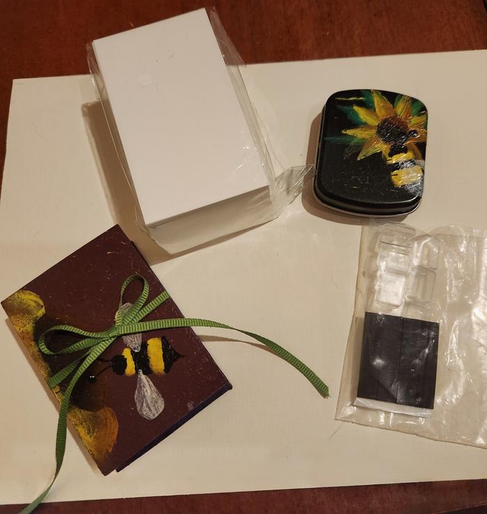 Full set, including extra paint pans & a fresh pack of trading cards for her to paint. 