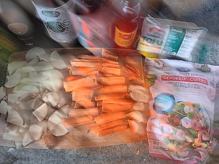 Blurry pic of veggies, proteins, and flavourings used
