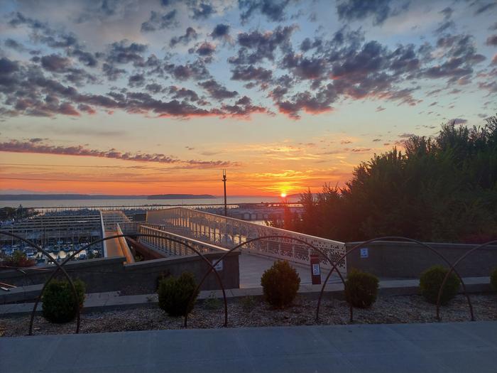 sunset over the Everett marina and the pedestrian bridge to get there