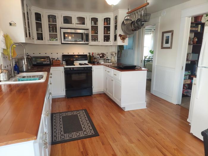 large kitchen with wood countertops