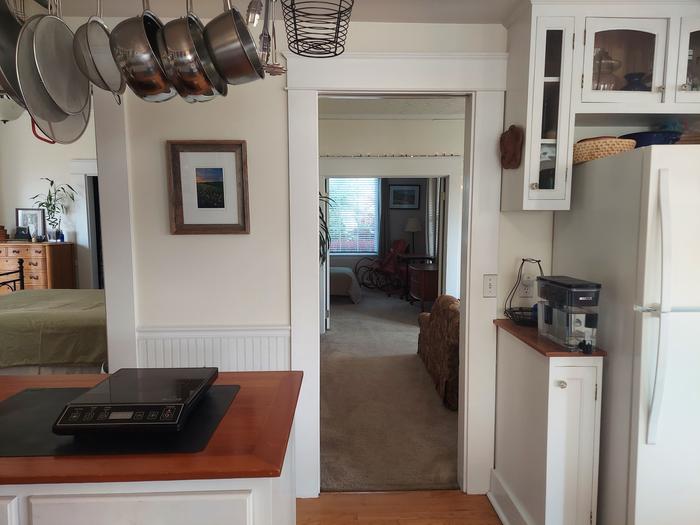 kitchen looking through the living room toward the den