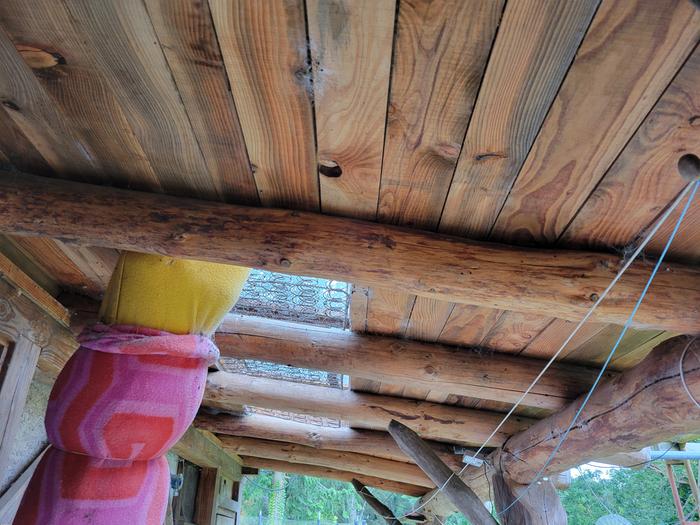 This is the porch ceiling and roof support.
