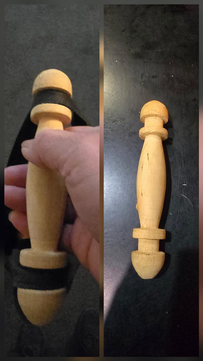 Wooden handle for plastic carrier bag