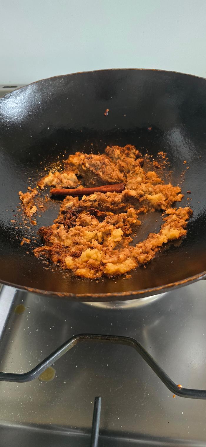 Cooking the onions and ginger pastel with the spices