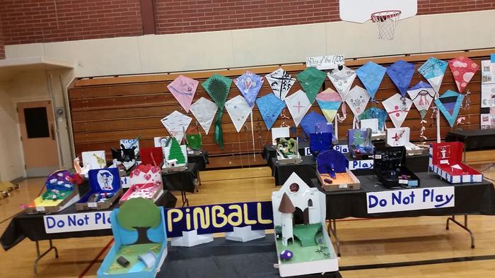 Sorry the image was crooked--I was standing on a table to get both my Toy Science physics classes pinball machines and the kites