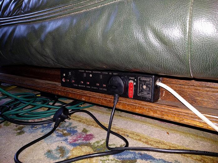 Electric outlets fitted to front of sofa