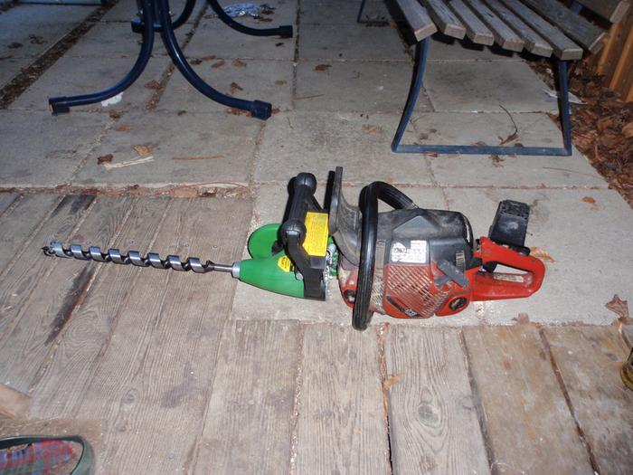 My chainsaw engine with the drill attachment and a 30mm x 450mm auger