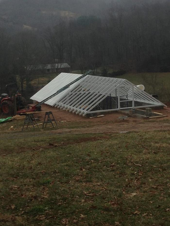 installing solexx roof on walipini greenhouse