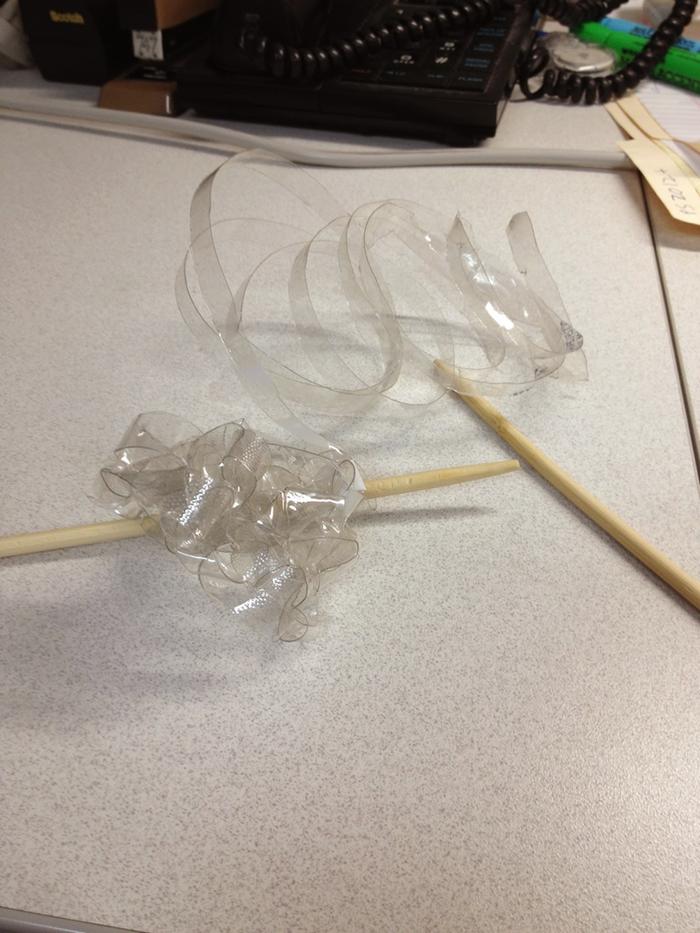 a water bottle cut into thinish spiral