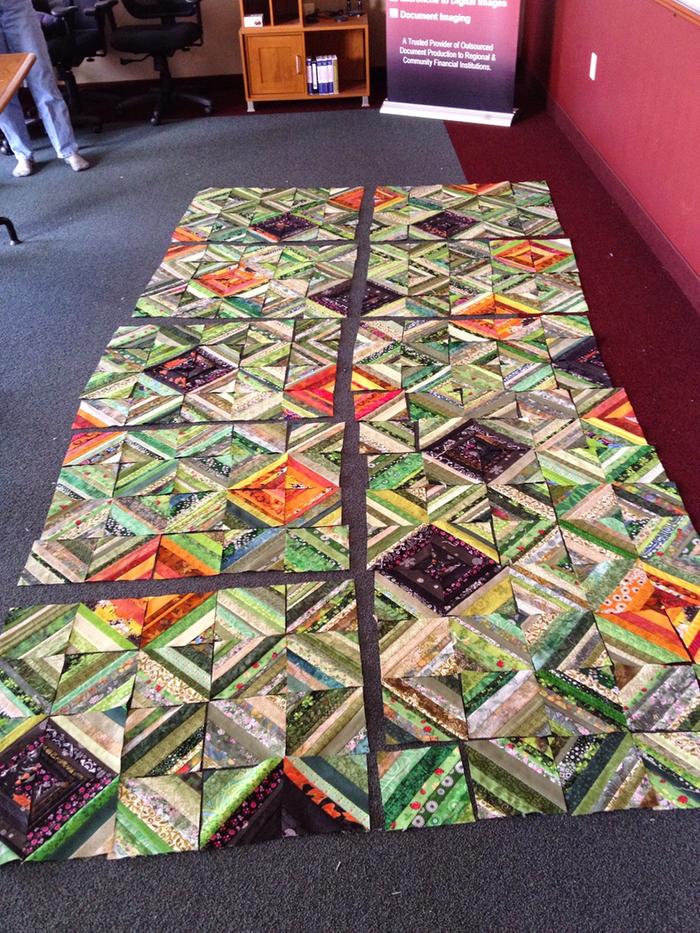 quilt top during layout -- nothing half-assed here