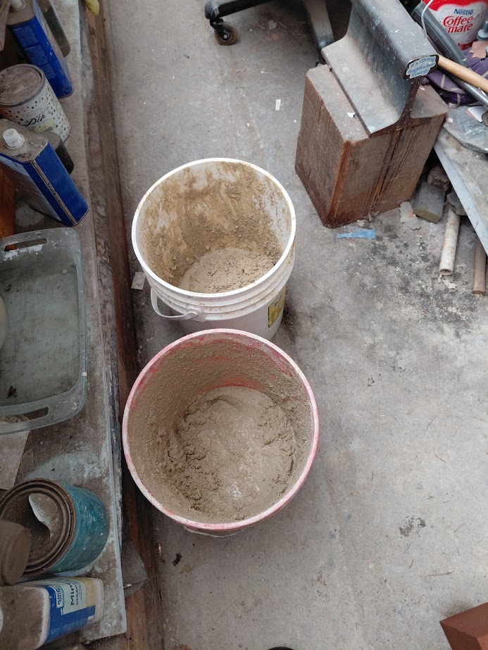 two buckets of mortar always ready