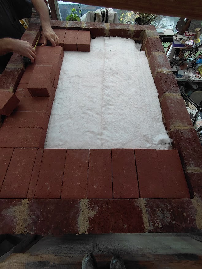 putting on the second roof