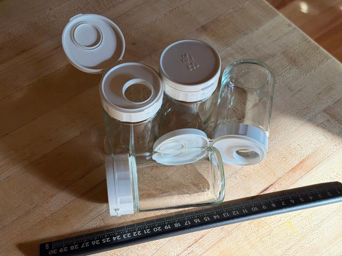 Four jars and a ruler