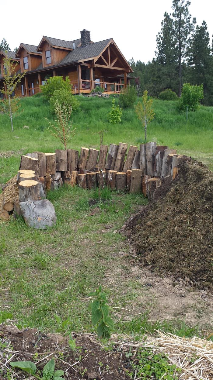 I set this one up to block the wind, shed the cold air coming down the hill, and retain moisture.